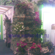 Оформление выставочного стенда искусственным каскадным водопадом с кашпо под цветы. - Крокус Экспо - г. Москва, 2012г.