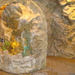 Искусственный грот из искусственного камня с потайной дверью и водопадом в интерьере. - 2009 г.